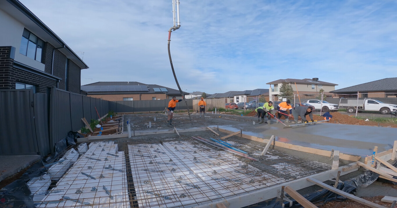 Commercial concrete installation crew at work on large project